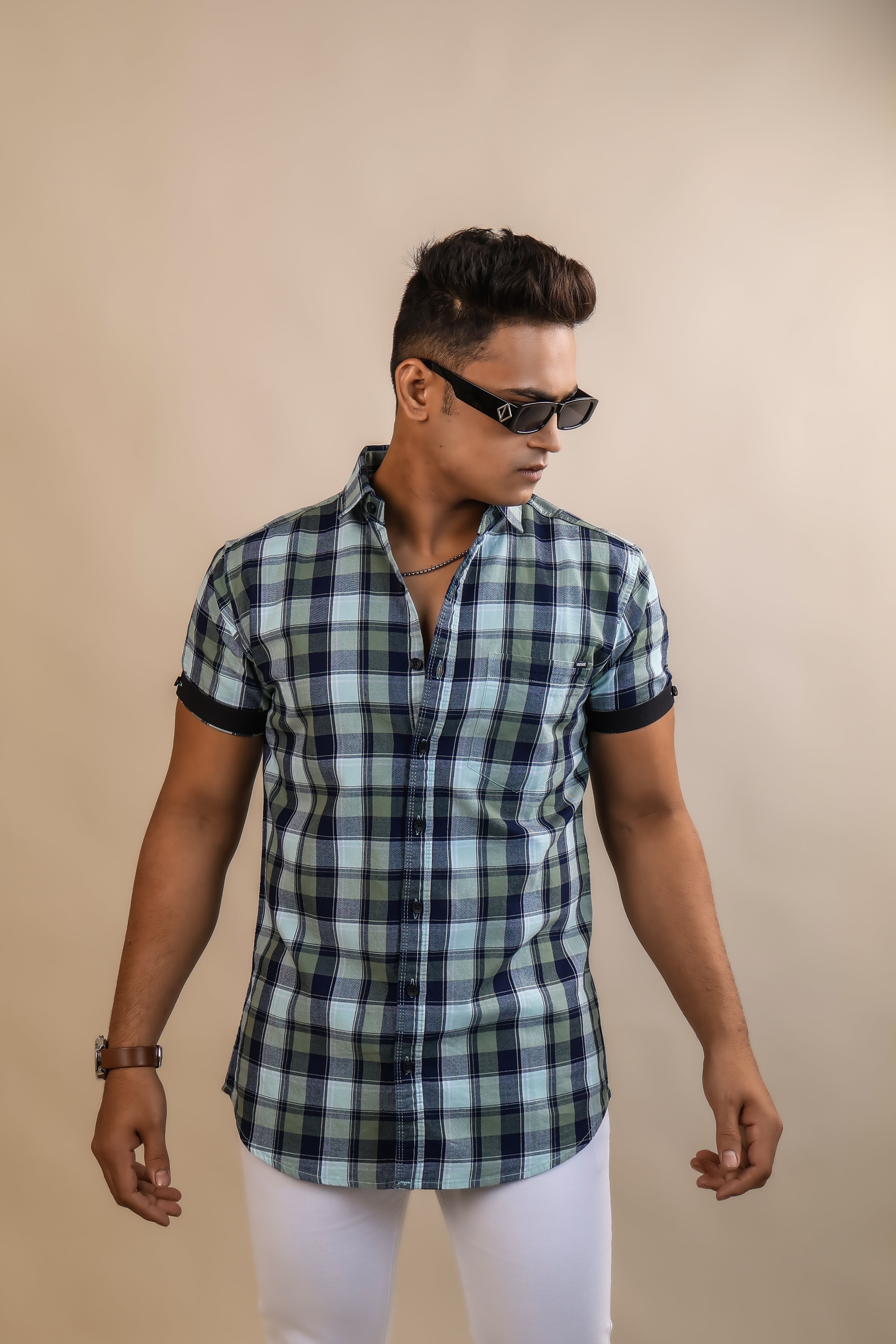 Olive color color checks half sleeve casual shirt shirt for casual wear.