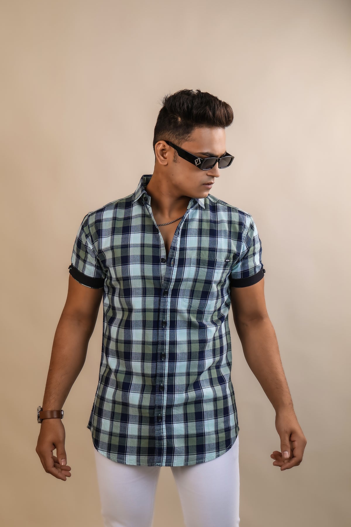 Olive color color checks half sleeve casual shirt shirt for casual wear.