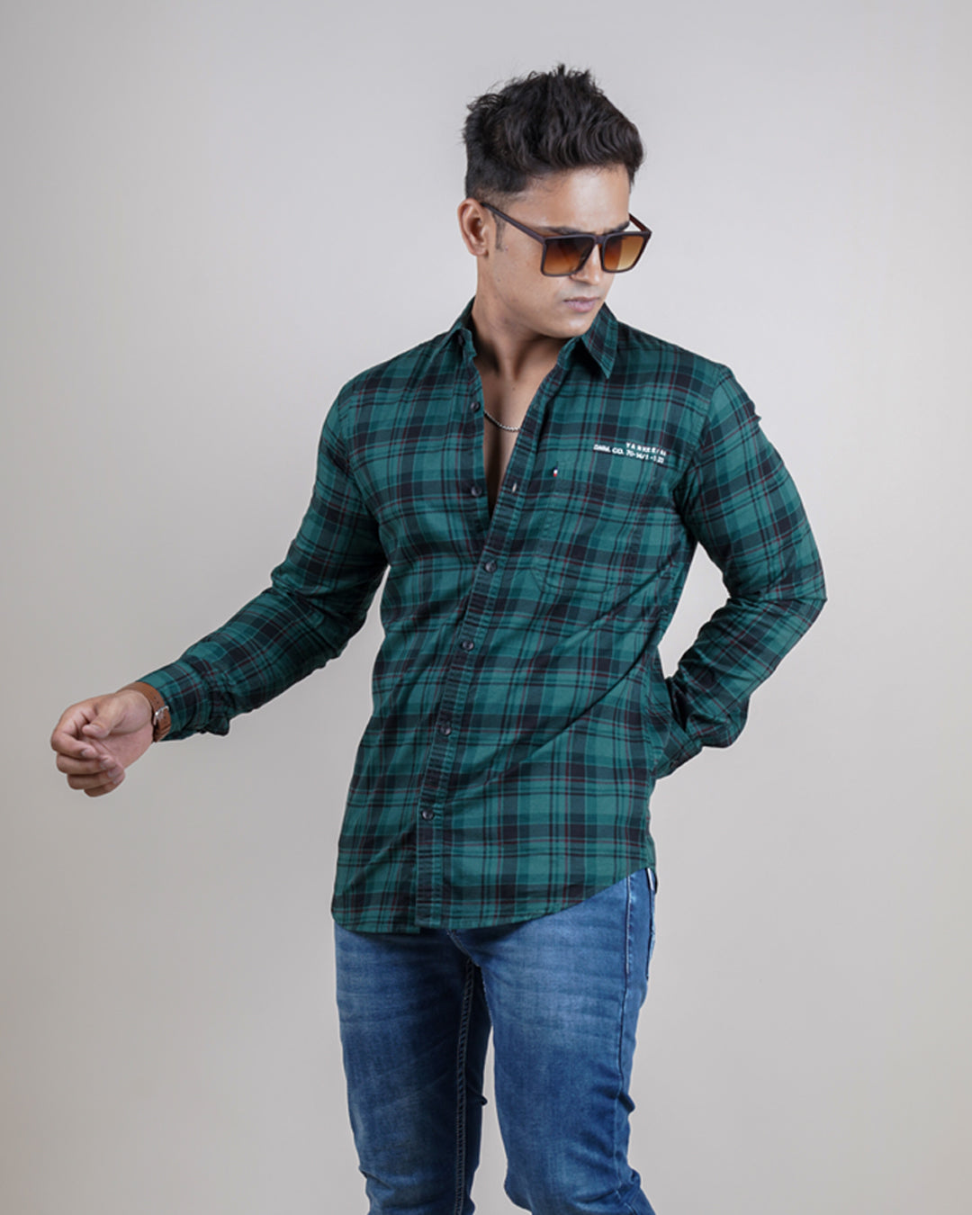 Green color color checks casual shirt shirt for casual wear.