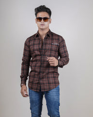 Brown color color checks casual shirt shirt for casual wear.